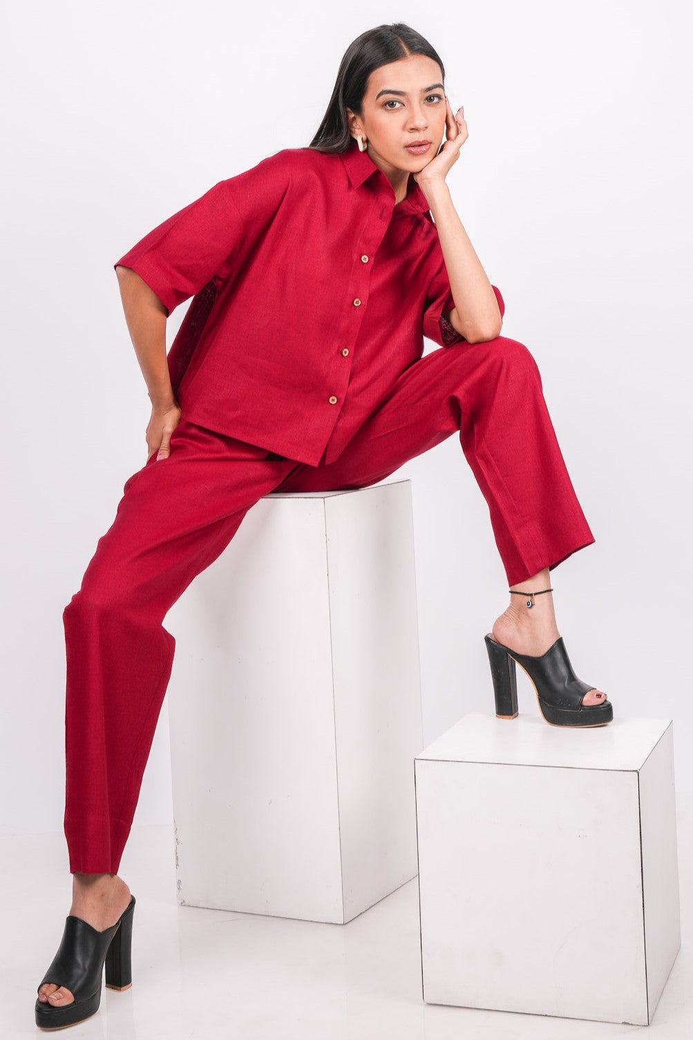 Cherry Red Linen Co-Ord Set, featuring a pair of pants and a half sleeves drooping shoulder shirt.